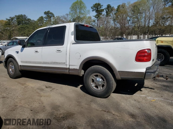 2002 Ford F-150 XLT with VIN 1FTRW07L32KE29159, listed as a Copart auction lot 50596125 with 198,058 mi miles and Salvage Title. Bid and sale history available at carsss.com. Image 2.