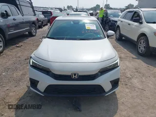 2022 Honda Civic EX with VIN JHMFE1F78NX004526, listed as a IAAI auction lot 42430668 with 56,246 mi miles and . Bid and sale history available at DreamBid. Image 12.