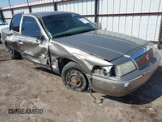 2004 Mercury Grand Marquis GS with VIN 2MEFM74W94X674014, listed as a IAAI auction lot 41973693 with 163,865 mi miles and . Bid and sale history available at DreamBid. Image 1.