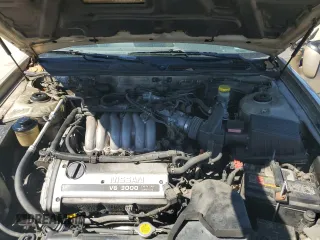 1997 Nissan Maxima GXE z VIN JN1CA21DXVT877062, wystawiony jako Copart lot #49411185 z przebiegiem 249 941 mil mil oraz Szkoda całkowita • Salvage title. Historia ofert i sprzedaży dostępna na DreamBid. Obrazek 13.