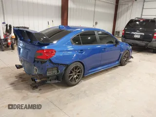 2015 Subaru WRX with VIN JF1VA1A61F9834946, listed as a IAAI auction lot 41636643 with 85,013 mi miles. Bid and sale history available at carsss.com. Image 4.