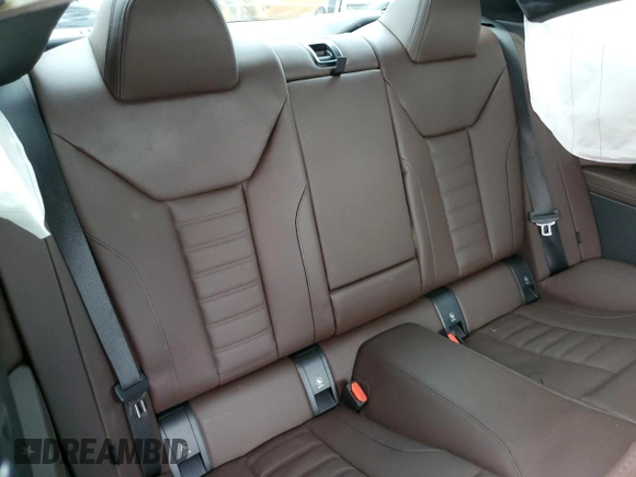2022 BMW 4 Series 430i z VIN WBA53AP00NCJ55465, wystawiony jako Copart lot #86392324 z przebiegiem 28 873 mil mil oraz Szkoda całkowita • Salvage title. Historia ofert i sprzedaży dostępna na DreamBid. Obrazek 10.