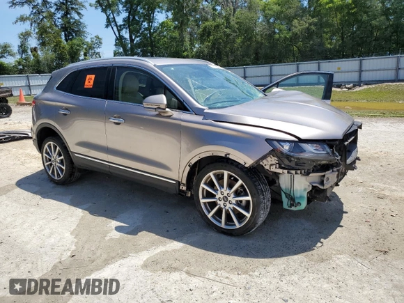 2019 Lincoln MKC Reserve with VIN 5LMCJ3C97KUL02010, listed as a Copart auction lot 57616845 with 73,501 mi miles and Non repairable. Bid and sale history available at DreamBid. Image 4.