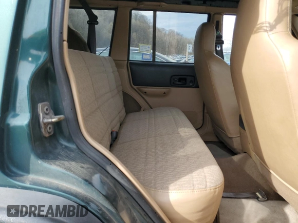 2001 Jeep Cherokee Sport with VIN 1J4FF48S61L575056, listed as a Copart auction lot 53808195 with 0 mi miles and Clean Title. Bid and sale history available at carsss.com. Image 10.