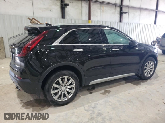 2020 Cadillac XT4 FWD Premium Luxury z VIN 1GYFZCR41LF143039, wystawiony jako Copart lot #57164005 z przebiegiem 24 218 mil mil oraz Nie do naprawy • Non repairable. Historia ofert i sprzedaży dostępna na DreamBid. Obrazek 3.