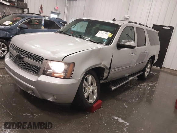 2011 Chevrolet Suburban LTZ with VIN 1GNSKKE31BR143238, listed as a IAAI auction lot 41621927 with 224,313 mi miles and . Bid and sale history available at DreamBid. Image 19.