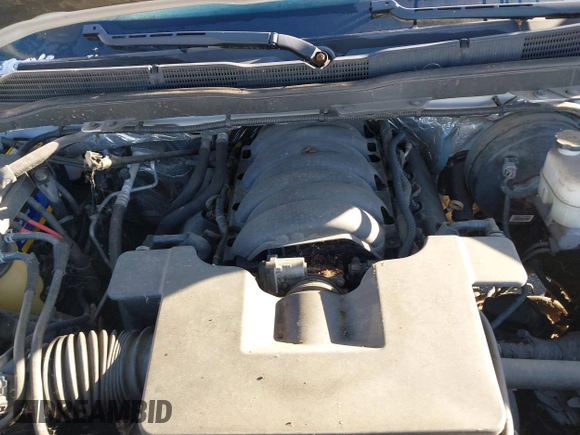 2015 Chevrolet Silverado 1500 Work Truck with VIN 1GCNKPEC6FZ355609, listed as a IAAI auction lot 41819740 with 125,703 mi miles. Bid and sale history available at carsss.com. Image 10.