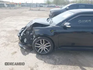2015 Scion tC z VIN JTKJF5C75FJ012021, wystawiony jako IAAI lot #42143878 z przebiegiem 127 235 mil mil oraz . Historia ofert i sprzedaży dostępna na DreamBid. Obrazek 6.