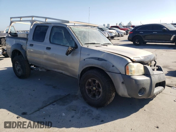 2002 Nissan Frontier SE with VIN 1N6ED27T52C383700, listed as a Copart auction lot 86204074 with 216,908 mi miles and Salvage title. Bid and sale history available at DreamBid. Image 4.