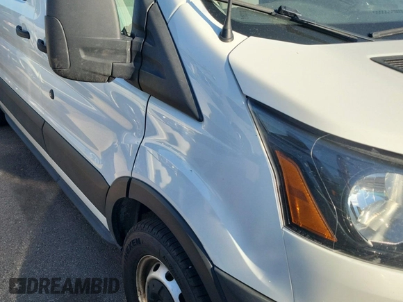 2019 Ford Transit z VIN 1FTYR2CG7KKA96911, wystawiony jako IAAI lot #42566551 z przebiegiem 207 807 mil mil oraz . Historia ofert i sprzedaży dostępna na DreamBid. Obrazek 42.