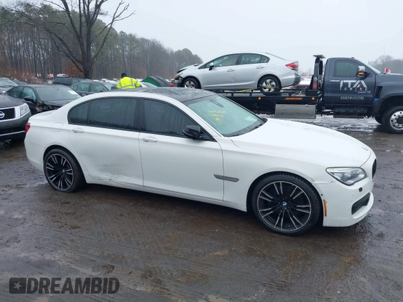 2015 BMW 7 Series 750Li xDrive with VIN WBAYF8C5XFD655174, listed as a IAAI auction lot 41480525 with 79,238 mi miles and . Bid and sale history available at carsss.com. Image 13.