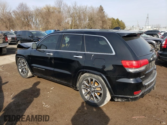 2018 Jeep Grand Cherokee Overland with VIN 1C4RJFCG8JC262591, listed as a Copart auction lot 47814985 with 135,542 mi miles and Salvage Title. Bid and sale history available at carsss.com. Image 2.