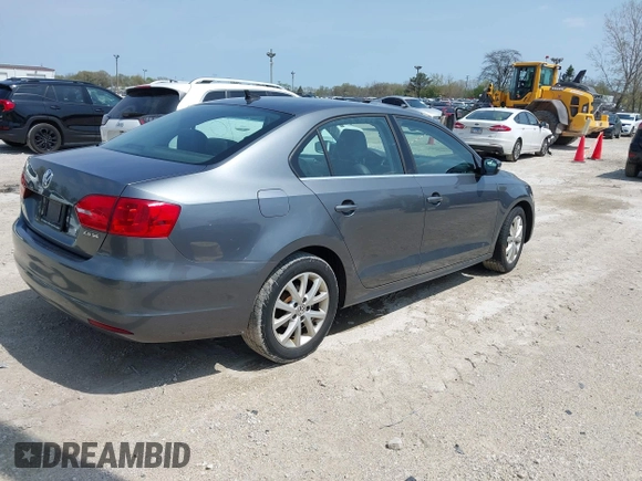 2013 Volkswagen Jetta SE z VIN 3VWDP7AJ3DM430540, wystawiony jako IAAI lot #42131097 z przebiegiem 121 838 mil mil oraz . Historia ofert i sprzedaży dostępna na DreamBid. Obrazek 4.