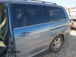 2005 Honda Odyssey EX with VIN 5FNRL38465B059893, listed as a IAAI auction lot 42790058 with 257,143 mi miles and . Bid and sale history available at DreamBid. Image 6.