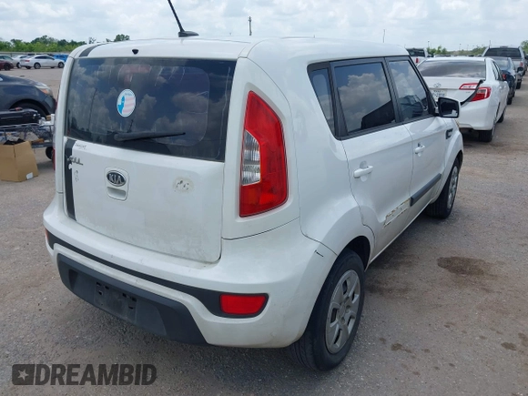 2012 Kia Soul with VIN KNDJT2A5XC7354508, listed as a IAAI auction lot 42078152 with 164,338 mi miles. Bid and sale history available at carsss.com. Image 4.