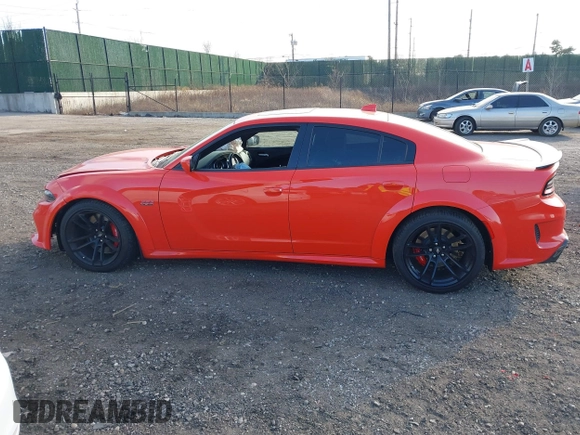 2022 Dodge Charger Scat Pack Widebody with VIN 2C3CDXGJ3NH101081, listed as a IAAI auction lot 41351466 with 9,575 mi miles and . Bid and sale history available at DreamBid. Image 14.