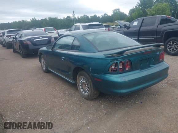 1996 Ford Mustang z VIN 1FALP4044TF226536, wystawiony jako IAAI lot #42468299 z przebiegiem 164 396 mil mil oraz . Historia ofert i sprzedaży dostępna na DreamBid. Obrazek 3.
