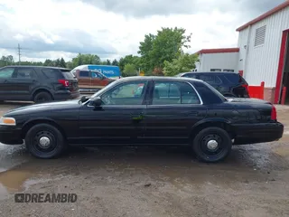 2005 Ford Police Interceptor z VIN 2FAHP71WX5X154384, wystawiony jako IAAI lot #40735796 z przebiegiem 84 143 mil mil oraz . Historia ofert i sprzedaży dostępna na DreamBid. Obrazek 14.