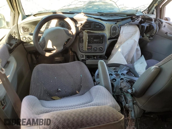 1999 Plymouth Voyager Grand SE z VIN 1P4GP44G1XB579504, wystawiony jako Copart lot #50064475 z przebiegiem Nie podano mil oraz Nie do naprawy. Historia ofert i sprzedaży dostępna na DreamBid. Obrazek 8.