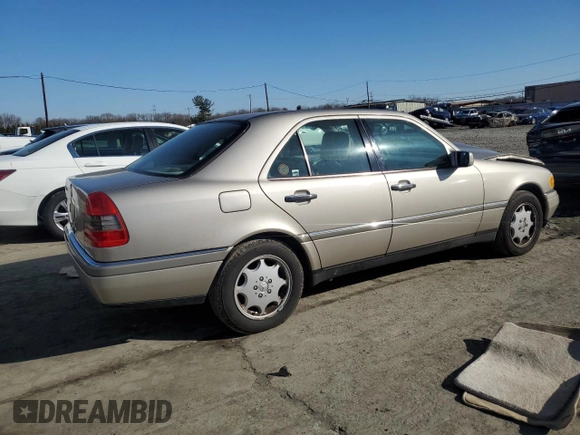 1996 Mercedes-Benz C with VIN WDBHA28E7TF319617, listed as a Copart auction lot 80874744 with 92,068 mi miles and Salvage Title. Bid and sale history available at carsss.com. Image 3.