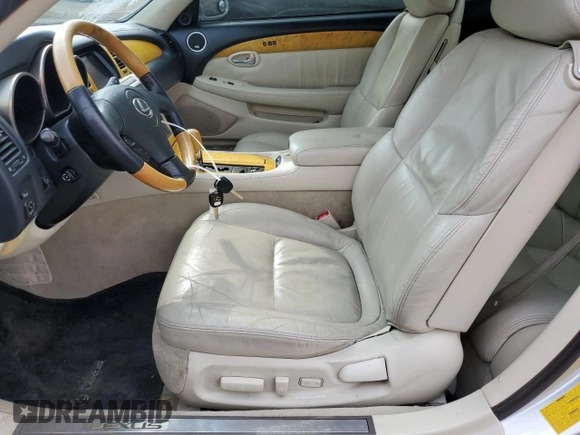 2002 Lexus SC 430 z VIN JTHFN48Y020004760, wystawiony jako Copart lot #56487275 z przebiegiem 136 275 mil mil oraz Szkoda całkowita • Salvage title. Historia ofert i sprzedaży dostępna na DreamBid. Obrazek 7.