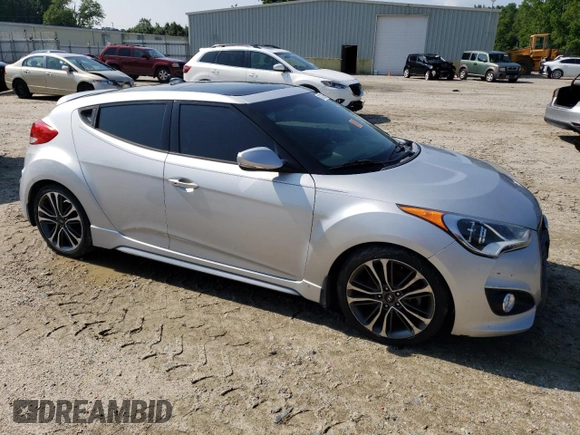 2016 Hyundai Veloster Turbo with VIN KMHTC6AEXGU254380, listed as a Copart auction lot 60766373 with 135,056 mi miles. Bid and sale history available at carsss.com. Image 4.