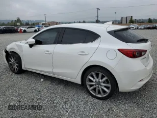 2017 Mazda 3 Grand Touring with VIN JM1BN1M35H1122136, listed as a Copart auction lot 54458755 with 62,515 mi miles and Salvage Title. Bid and sale history available at DreamBid. Image 2.