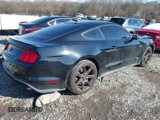 2019 Ford Mustang EcoBoost with VIN 1FA6P8TH8K5173458, listed as a IAAI auction lot 41085251 with 99,260 mi miles and . Bid and sale history available at carsss.com. Image 4.