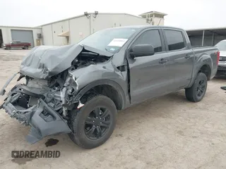 2023 Ford Ranger XL with VIN 1FTER4EH3PLE34388, listed as a IAAI auction lot 41649813 with 14,977 mi miles and . Bid and sale history available at DreamBid. Image 2.
