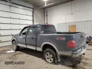 2002 Ford F-150 XLT with VIN 1FTRW08L12KE11970, listed as a Copart auction lot 45299665 with 173,802 mi miles and Salvage Title. Bid and sale history available at carsss.com. Image 2.