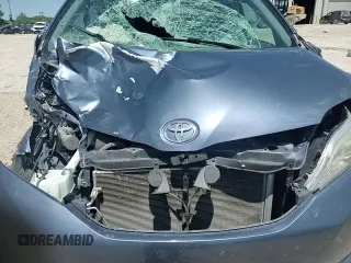 2015 Toyota Sienna LE with VIN 5TDJK3DC4FS107711, listed as a Copart auction lot 57693005 with 141,370 mi miles and Salvage title. Bid and sale history available at DreamBid. Image 14.
