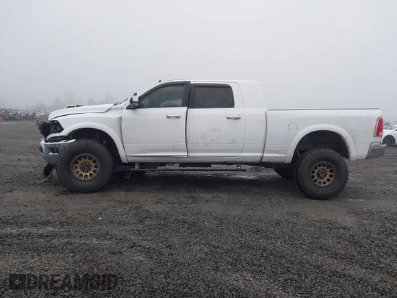 2016 Ram 2500 Laramie with VIN 3C6UR5NL2GG287071, listed as a IAAI auction lot 40989387 with 104,781 mi miles and . Bid and sale history available at DreamBid. Image 14.