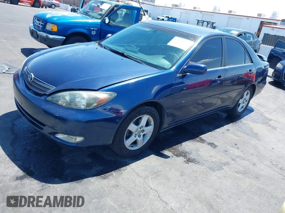 2003 Toyota Camry LE with VIN JTDBE32K130243265, listed as a IAAI auction lot 42145871 with Not Provided miles and . Bid and sale history available at DreamBid. Image 2.