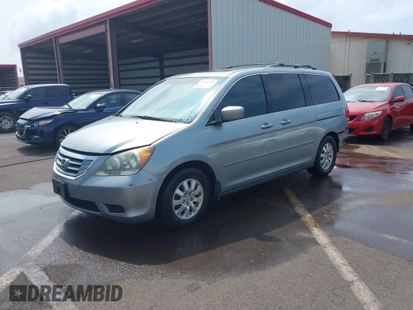 2010 Honda Odyssey EX-L with VIN 5FNRL3H6XAB061092, listed as a IAAI auction lot 41645143 with 165,941 mi miles. Bid and sale history available at carsss.com. Image 18.
