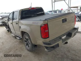 2022 Chevrolet Colorado 4WD Z71 with VIN 1GCGTDENXN1280108, listed as a IAAI auction lot 42275363 with 23,863 mi miles and . Bid and sale history available at DreamBid. Image 3.