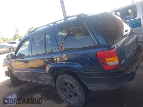 2000 Jeep Grand Cherokee Laredo with VIN 1J4G248SXYC274865, listed as a IAAI auction lot 42542922 with 185,902 mi miles and . Bid and sale history available at DreamBid. Image 14.