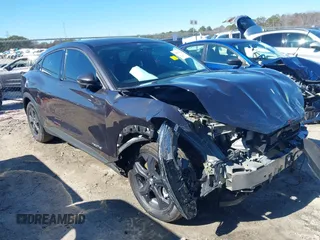 2021 Ford Mustang Mach-E Select with VIN 3FMTK1RM7MMA52193, listed as a IAAI auction lot 41591356 with 48,522 mi miles and . Bid and sale history available at DreamBid. Image 1.