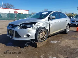 2014 Ford Focus Titanium with VIN 1FADP3J28EL354505, listed as a IAAI auction lot 42025966 with 104,868 mi miles. Bid and sale history available at carsss.com. Image 18.
