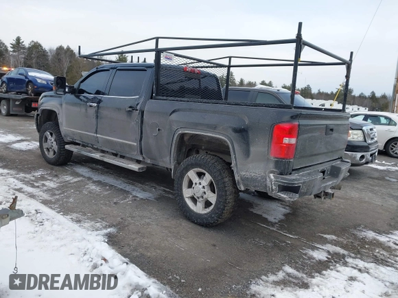 2016 GMC Sierra 2500HD Denali z VIN 1GT12UE81GF128498, wystawiony jako IAAI lot #41346398 z przebiegiem 164 532 mil mil oraz . Historia ofert i sprzedaży dostępna na DreamBid. Obrazek 3.