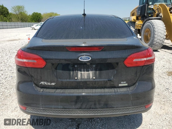 2018 Ford Focus SE z VIN 1FADP3FE5JL236330, wystawiony jako Copart lot #53145065 z przebiegiem 104 228 mil mil oraz Szkoda całkowita • Salvage title. Historia ofert i sprzedaży dostępna na DreamBid. Obrazek 6.