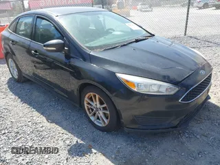 2015 Ford Focus SE with VIN 1FADP3F28FL381875, listed as a IAAI auction lot 41872632 with 299,043 mi miles. Bid and sale history available at carsss.com. Image 1.