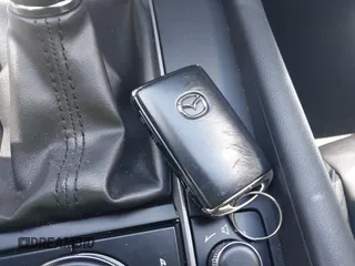 2022 Mazda 3 Select z VIN JM1BPAKL1N1519383, wystawiony jako IAAI lot #39742243 z przebiegiem 20 080 mil mil oraz . Historia ofert i sprzedaży dostępna na DreamBid. Obrazek 11.