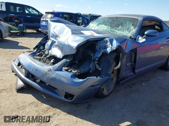 2006 Chrysler Crossfire Limited with VIN 1C3AN69L16X063571, listed as a IAAI auction lot 41353141 with 103,477 mi miles and . Bid and sale history available at DreamBid. Image 6.