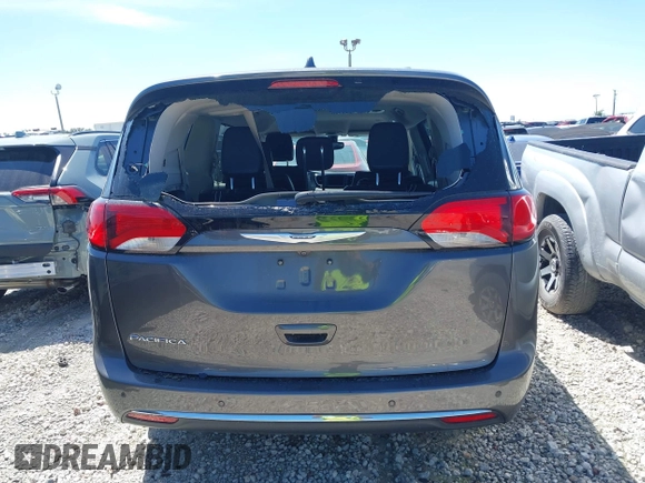 2020 Chrysler Pacifica Touring L z VIN 2C4RC1BG7LR284994, wystawiony jako IAAI lot #41661416 z przebiegiem 101 257 mil mil oraz . Historia ofert i sprzedaży dostępna na DreamBid. Obrazek 16.