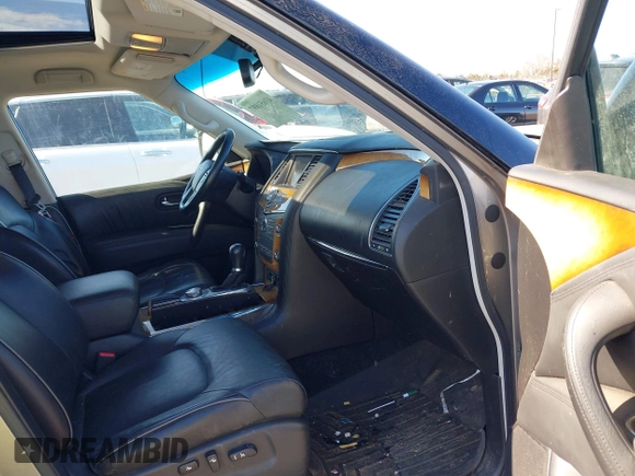 2012 Infiniti QX56 7-passenger z VIN JN8AZ2NE9C9016633, wystawiony jako IAAI lot #41651897 z przebiegiem 191 558 mil mil oraz . Historia ofert i sprzedaży dostępna na DreamBid. Obrazek 5.