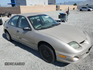 2002 Pontiac Sunfire SE z VIN 1G2JB524227409529, wystawiony jako Copart lot #59048045 z przebiegiem 89 377 mil mil oraz Szkoda całkowita • Salvage title. Historia ofert i sprzedaży dostępna na DreamBid. Obrazek 4.