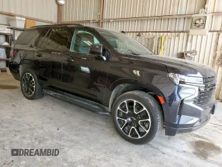 2023 Chevrolet Tahoe RST with VIN 1GNSCRKD5PR290351, listed as a Copart auction lot 58806595 with 64,909 mi miles and Salvage title. Bid and sale history available at DreamBid. Image 4.