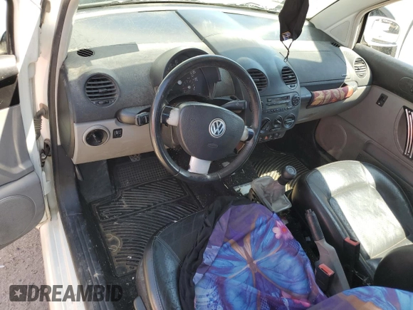 2001 Volkswagen Beetle GLX z VIN 3VWDD21C71M435250, wystawiony jako Copart lot #65546334 z przebiegiem 189 542 mil mil oraz Szkoda całkowita • Salvage title. Historia ofert i sprzedaży dostępna na DreamBid. Obrazek 8.