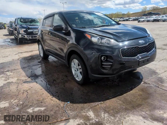 2017 Kia Sportage LX z VIN KNDPMCAC3H7156999, wystawiony jako Copart lot #54915525 z przebiegiem 62 909 mil mil oraz Szkoda całkowita • Salvage title. Historia ofert i sprzedaży dostępna na DreamBid. Obrazek 14.
