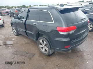 2015 Jeep Grand Cherokee Overland with VIN 1C4RJECG1FC769950, listed as a IAAI auction lot 42405712 with 217,514 mi miles and . Bid and sale history available at DreamBid. Image 3.